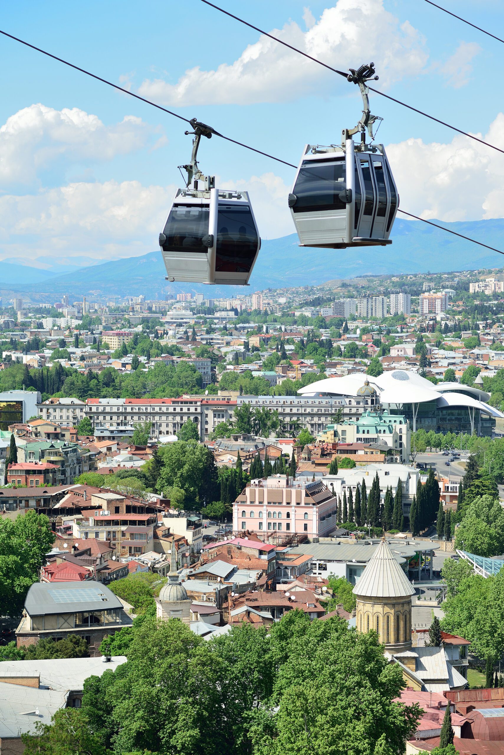 Cabs cable car on the background of Tbilisi. Funicular. Georgia
