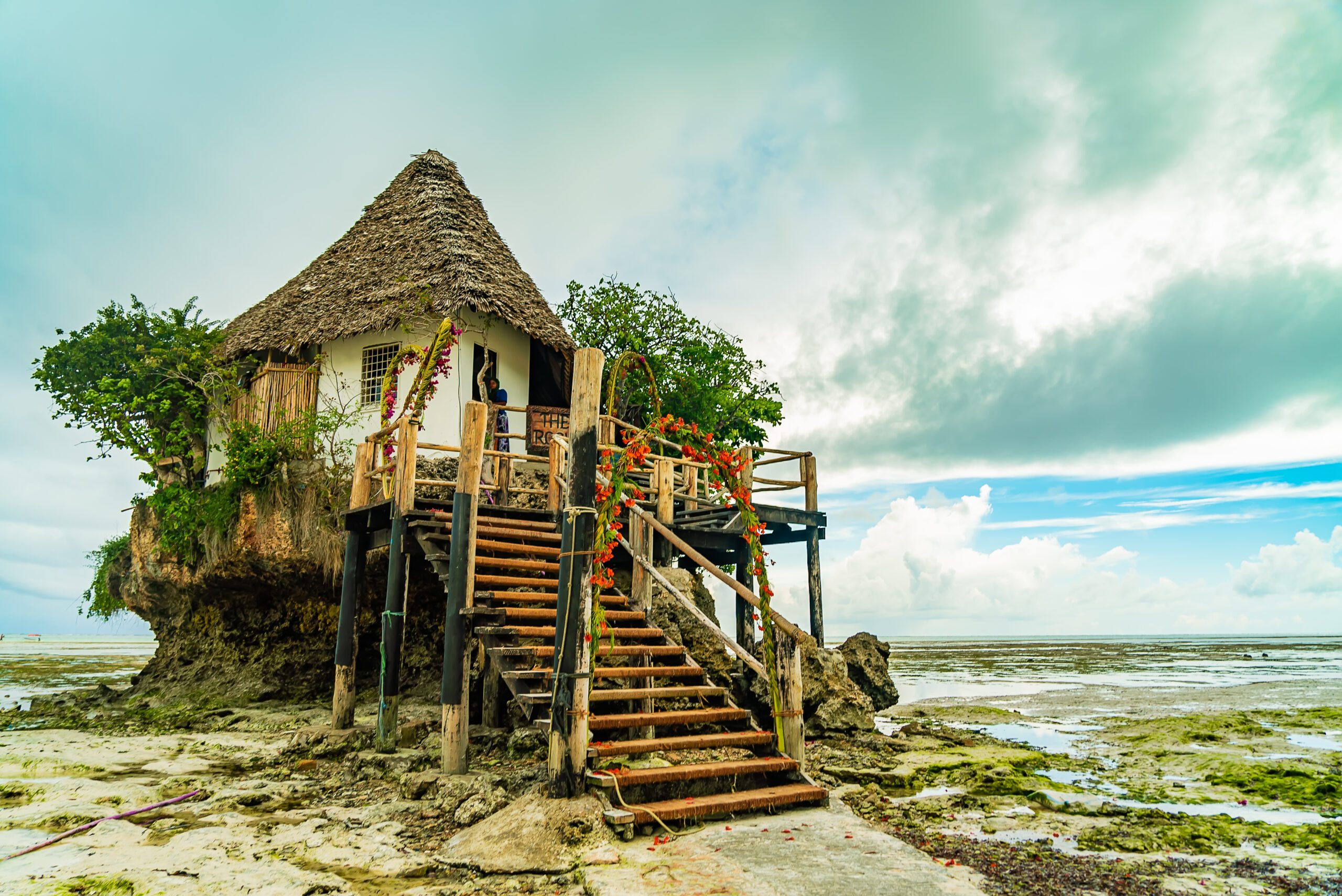 The Rocks restaurant on the beach during low tide. Pingwe, Zanzibar, Tanzania