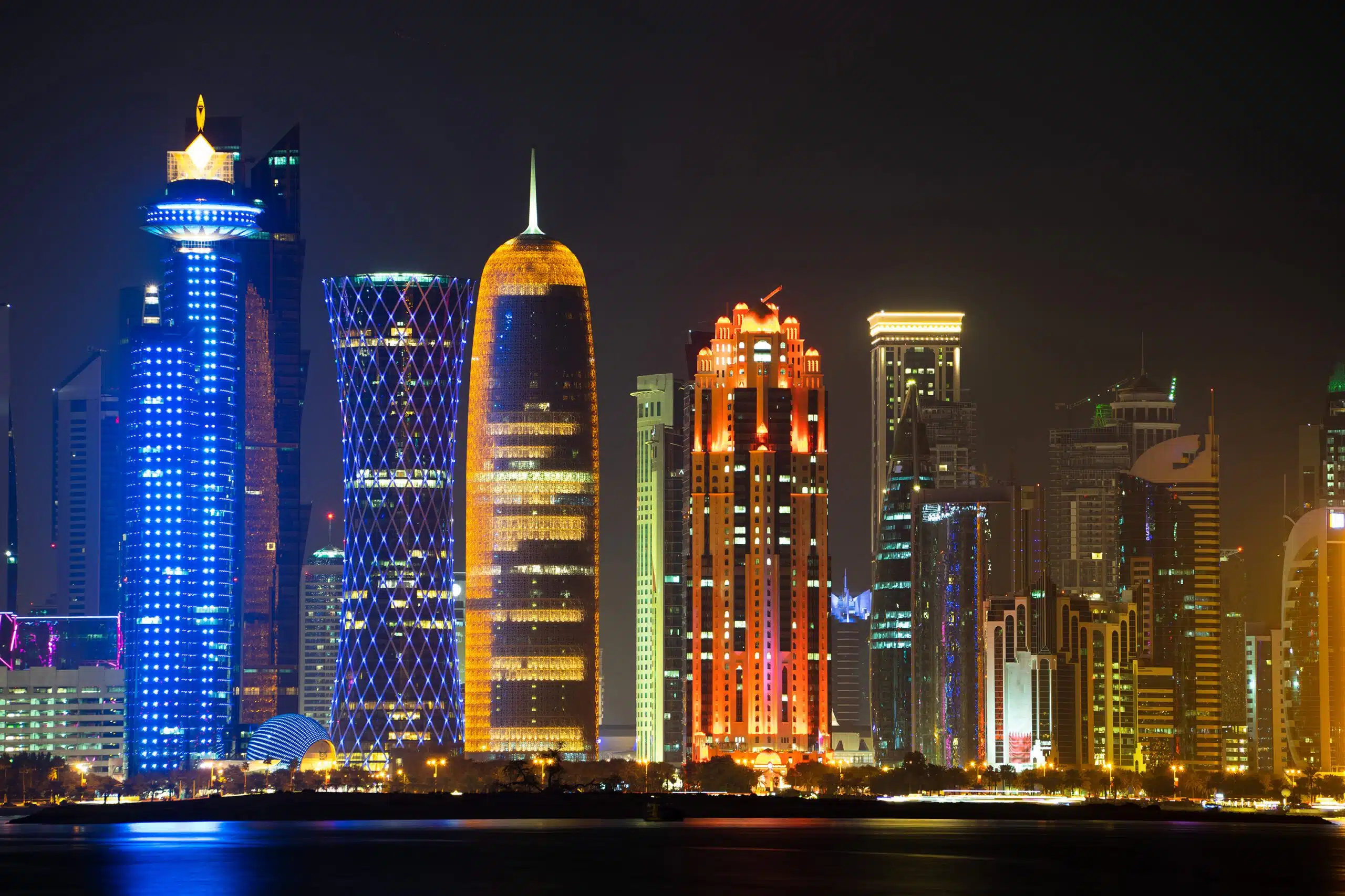 Vibrant Skyline of Doha at Night as seen from the opposite side of the capital city bay at night