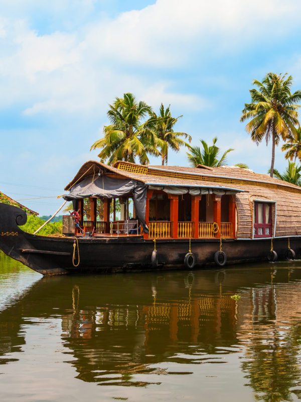 A houseboat sailing in Alappuzha backwaters in Kerala state in India